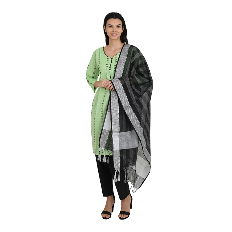 Female model in light green kurta with grey dupatta and black pants - ethnic wear ecommerce photography by Lohar Studio Delhi